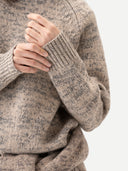 Unisex Mouline Cashmere Sweater Oxford Tan worn by model, detail view on white background