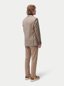 Men's Taupe single-breasted cashmere blazer worn by model back view on backround