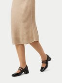 Beige knitted cashmere scarf on a light gray background #color_beige