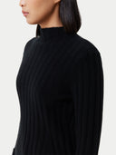 A black ribbed knit mock neck cashmere sweater with long sleeves and ribbed cuffs, displayed flat against a light gray background. #color_black