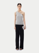 Gray one-shoulder tank cashmere top with a brand label on a white background #color_urban-gray