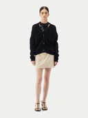 Black cardigan on a light gray background.  #color_garphite_black