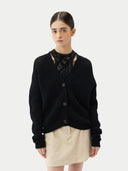 Black cardigan on a light gray background.  #color_garphite_black