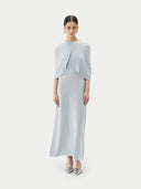 A model is wearing sleeveless cashmere Capelet  #color_ice-flow #color_ice-flow