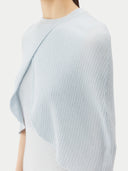 A model is wearing sleeveless cashmere Capelet  #color_ice-flow #color_ice-flow