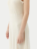 White sleeveless dress on a white background #color_cream-white