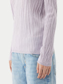 A light lavender ribbed knit long-sleeve top with a crew neck, displayed flat against a light gray background. #color_pale-orchid