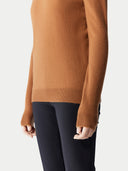 Women's Chipmunk Cashmere Crew Neck Sweater worn by model, detail view on white background.