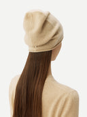 Cashmere € 99 Hat & Sweater Set Beige worn by model, back view on white background