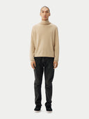 Men's Beige Cashmere Basic Turtle Neck Sweater Beige worn by model, front view on white background
