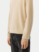 Men's Beige Cashmere Basic Turtle Neck Sweater Beige worn by model, detail view on white background
