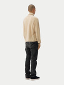 Men's Beige Cashmere Basic Turtle Neck Sweater Beige worn by model, back view on white background
