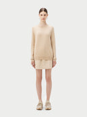 Women's Beige Cashmere Basic Crew Neck Sweater worn by model, front view on white background
