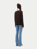 € 99 Cashmere Hat & Sweater Set Brown  worn by model, back view on white background