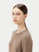 Women's Taupe Crewneck Cashmere Sweater worn by model, detail view on white background