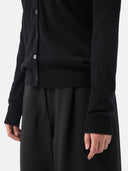 Women's Black Cashmere  V-Neck  Cardigan  worn by model, detail view on white background