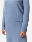 Women's Cropped Crewneck Cashmere Sweater Dusty Blue worn by model, detail view on white background