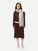 Women's Deep Mahogany  A-Line Cashmere Knitted Skirt worn by model, front view on white background
