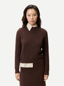 Women's Cropped Crewneck Cashmere Sweater Deep Mahogany worn by model, detail view on white background