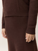 Women's Cropped Crewneck Cashmere Sweater Deep Mahogany worn by model, detail view on white background