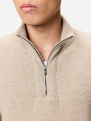 Men's Organic Colour Cashmere Waffle Knit Half-Zip Sweater Warm Grey worn by model, detail view on white background