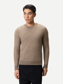 Man wearing a beige textured cashmere sweater on a white background.  #color_taupe
