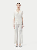 Women's Silk Cashmere Polo Shirt Whisper White worn by model, front view on white background
