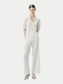 Women's Silk Cashmere Polo Shirt Whisper White worn by model, front view on white background
