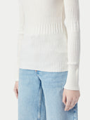 A white ribbed knit sweater with a wide boat neckline, long sleeves, and ribbed cuffs and hem, shown flat against a light gray background. #color_pure-white