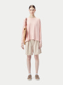 Pink long-sleeve sweater on a light gray background #color_soft-primrose