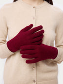 Essential Knit Cashmere Gloves in burgundy, featuring a snug rib-knit cuff for warmth and comfort.