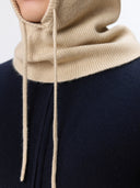 Cashmere Balaclava Beige worn by model, side view on white background #color_beige