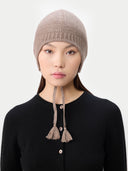  Ultimate Warmth Knit Tie Hat Taupe  worn by model, front view on white background
