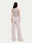 Women's Cashmere Crop Top Dawn Blue worn by model, back view on white backround