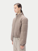 Beige puffer cashmere jacket on a light gray background #color_taupe