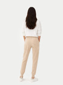 Women's Cashmere Cuffed Jogger Beige  worn by model, back view on white background