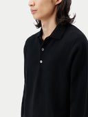 Black cashmere sweater with collar on a light gray background #color_black