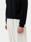 Black cashmere sweater with collar on a light gray background #color_black