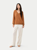 Women's Chipmunk Cashmere V-Neck Sweater worn by model, front view on white background 
