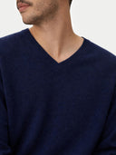 Men's Navy Cashmere V-Neck Sweater  worn by model, detail view on white background