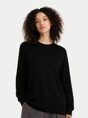 Women C-Neck  Cashmere Sweater Black  worn by model, detail view on white background