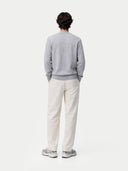 Men's high rise Cashmere Crewneck Sweater worn by model, back view on white background 