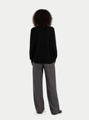 Women C-Neck  Cashmere Sweater Black  worn by model, back view on white background