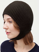 Model wearing the Knitted Aviator Cap in Olive Brown, close front view