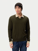 Model wearing the Seamless Cashmere Rib Knit Beanie in Olive Brown, full-length front view