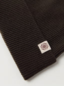 The Seamless Cashmere Rib Knit Beanie in Olive Brown, close-up of the cashmere knit
