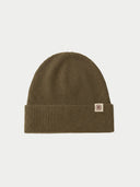 The Seamless Cashmere Rib Knit Beanie in Muted Green, flat lay front view