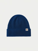 The Seamless Cashmere Rib Knit Beanie in Deep Blue, flat lay front view