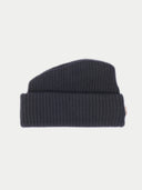 Dark gray knit beanie on a light gray background