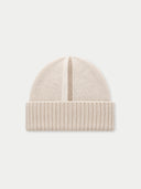 A light beige ribbed knit beanie hat with a vertical center seam on the crown, shown flat against a light gray background.